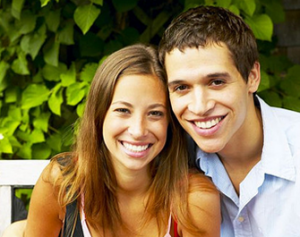 Smiling couple from Rockford, MI found laser dentistry near Grand Rapids at Eric Hull DDS Aesthetic & General Dentistry.